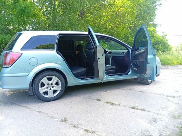 Синий Опель Астра, объемом двигателя 1.6 л и пробегом 265 тыс. км за 5700 $, фото 4 на Automoto.ua