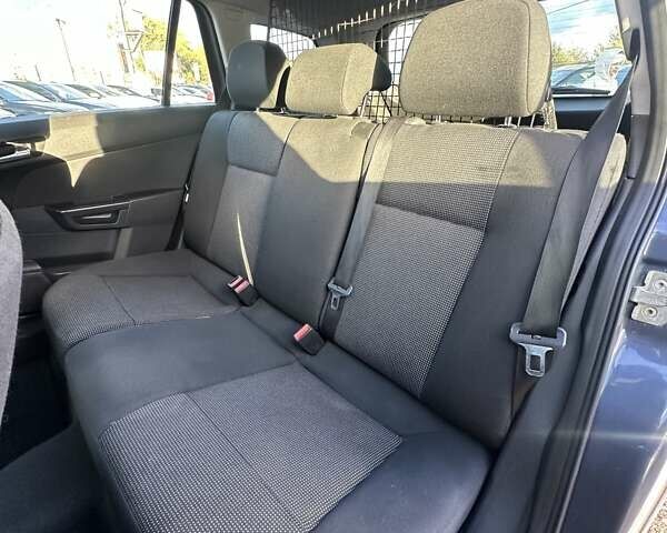 Синий Опель Астра, объемом двигателя 1.69 л и пробегом 257 тыс. км за 5800 $, фото 17 на Automoto.ua