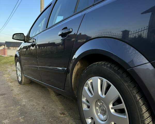 Синий Опель Астра, объемом двигателя 1.9 л и пробегом 260 тыс. км за 5700 $, фото 3 на Automoto.ua