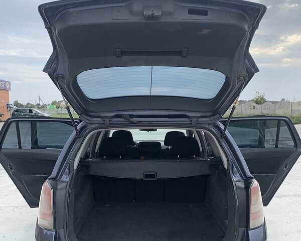 Синий Опель Астра, объемом двигателя 1.7 л и пробегом 340 тыс. км за 5500 $, фото 15 на Automoto.ua