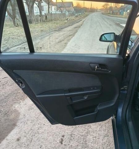 Синий Опель Астра, объемом двигателя 1.69 л и пробегом 244 тыс. км за 5500 $, фото 15 на Automoto.ua