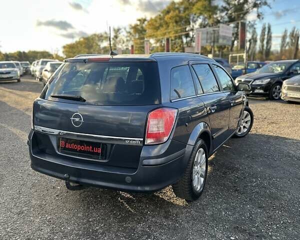 Синий Опель Астра, объемом двигателя 1.69 л и пробегом 257 тыс. км за 5800 $, фото 7 на Automoto.ua