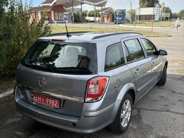 Синій Опель Астра, об'ємом двигуна 1.6 л та пробігом 245 тис. км за 5499 $, фото 3 на Automoto.ua