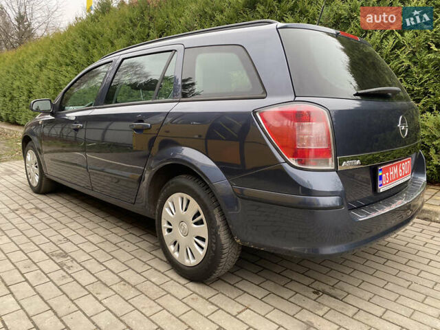 Синій Опель Астра, об'ємом двигуна 1.82 л та пробігом 230 тис. км за 5499 $, фото 4 на Automoto.ua