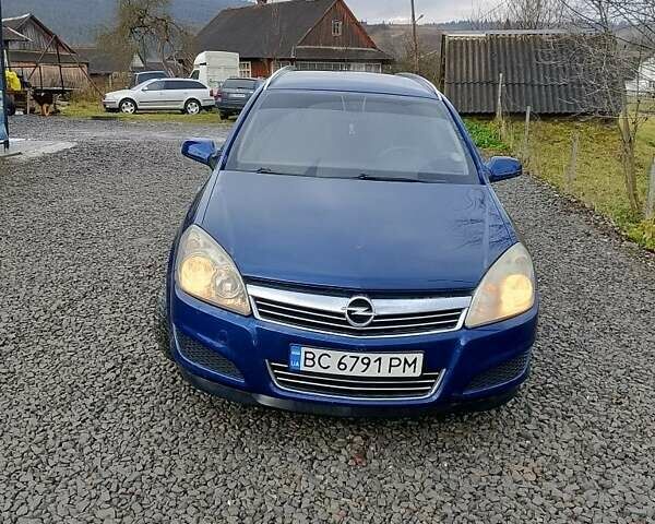 Синий Опель Астра, объемом двигателя 1.7 л и пробегом 330 тыс. км за 4400 $, фото 4 на Automoto.ua