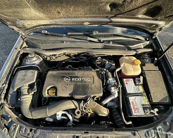 Синий Опель Астра, объемом двигателя 1.69 л и пробегом 257 тыс. км за 5800 $, фото 36 на Automoto.ua