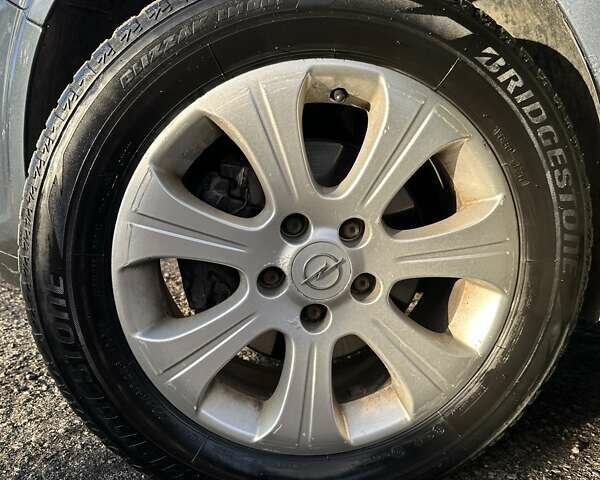 Синий Опель Астра, объемом двигателя 1.69 л и пробегом 257 тыс. км за 5800 $, фото 6 на Automoto.ua