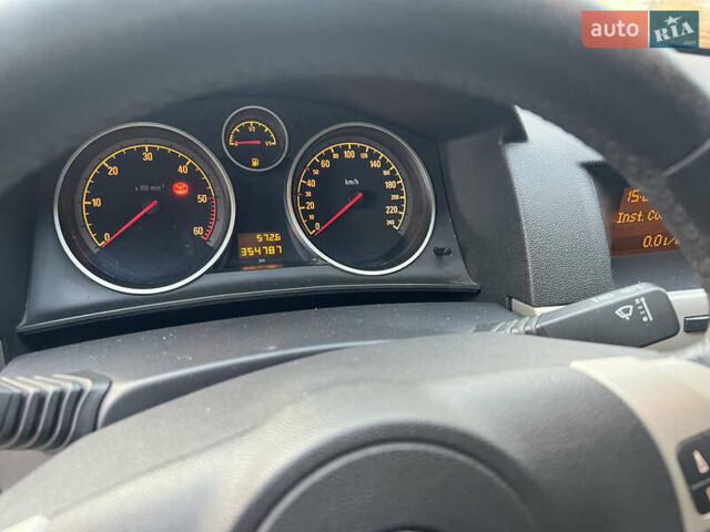 Синий Опель Астра, объемом двигателя 1.69 л и пробегом 354 тыс. км за 5000 $, фото 12 на Automoto.ua