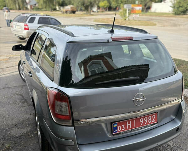 Синий Опель Астра, объемом двигателя 1.6 л и пробегом 240 тыс. км за 5400 $, фото 8 на Automoto.ua