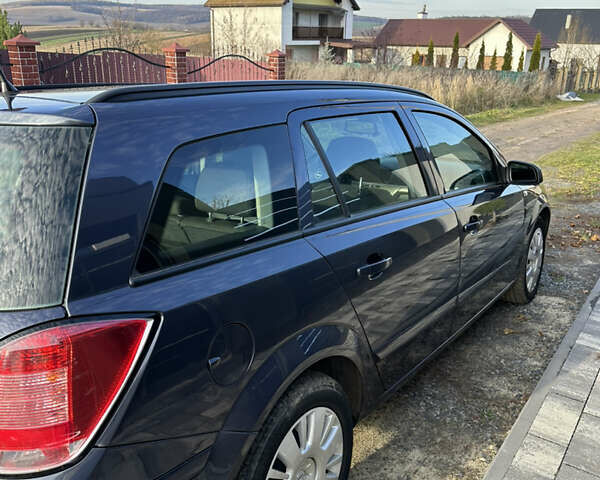 Синий Опель Астра, объемом двигателя 1.9 л и пробегом 260 тыс. км за 5700 $, фото 2 на Automoto.ua