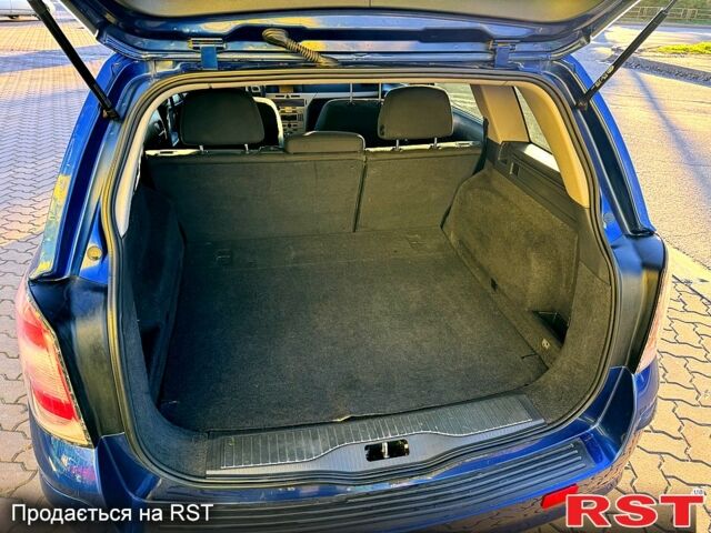 Синий Опель Астра, объемом двигателя 1.7 л и пробегом 318 тыс. км за 5350 $, фото 10 на Automoto.ua