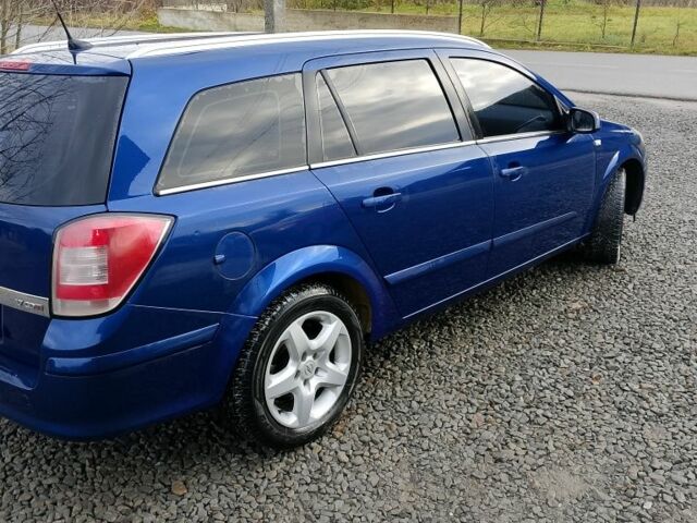 Синий Опель Астра, объемом двигателя 1.7 л и пробегом 330 тыс. км за 4400 $, фото 2 на Automoto.ua