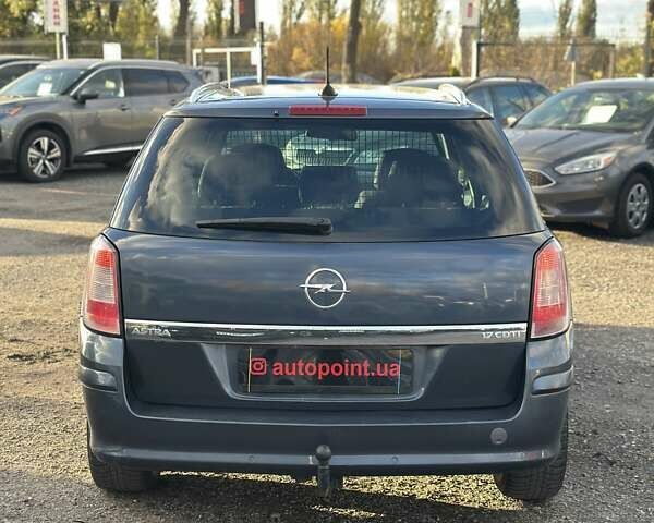 Синий Опель Астра, объемом двигателя 1.69 л и пробегом 257 тыс. км за 5800 $, фото 12 на Automoto.ua