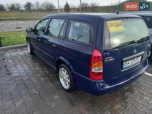 Синий Опель Астра, объемом двигателя 1.69 л и пробегом 300 тыс. км за 3600 $, фото 4 на Automoto.ua