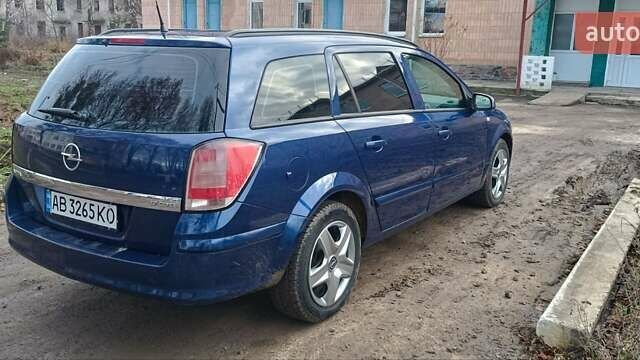 Синий Опель Астра, объемом двигателя 1.7 л и пробегом 288 тыс. км за 4499 $, фото 4 на Automoto.ua