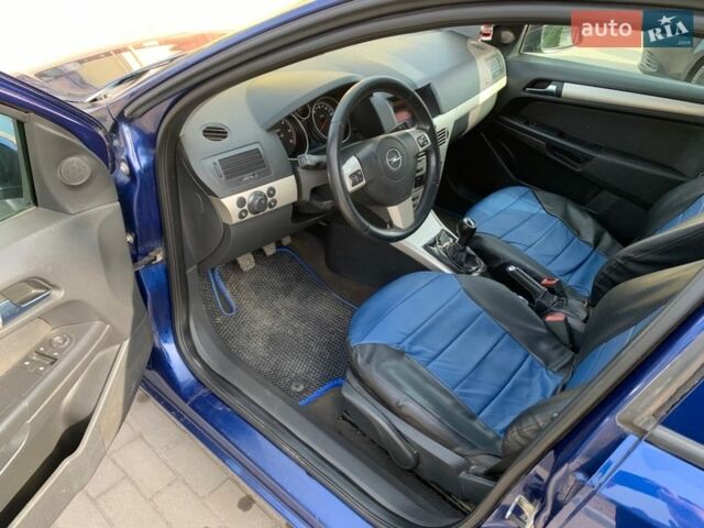 Синий Опель Астра, объемом двигателя 1.69 л и пробегом 290 тыс. км за 5600 $, фото 12 на Automoto.ua
