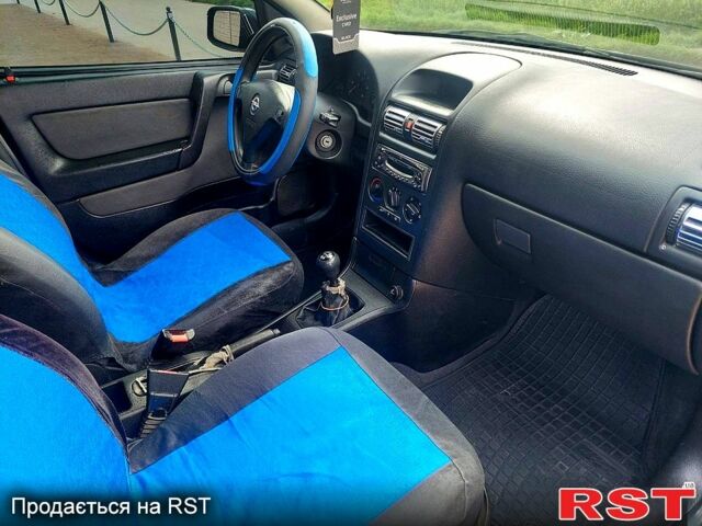 Синий Опель Астра, объемом двигателя 1.7 л и пробегом 302 тыс. км за 3350 $, фото 8 на Automoto.ua