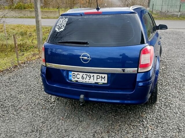 Синий Опель Астра, объемом двигателя 1.7 л и пробегом 330 тыс. км за 4400 $, фото 1 на Automoto.ua