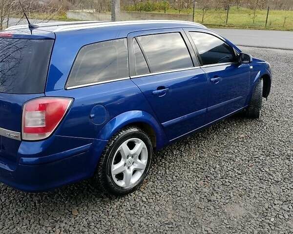 Синий Опель Астра, объемом двигателя 1.7 л и пробегом 330 тыс. км за 4400 $, фото 1 на Automoto.ua