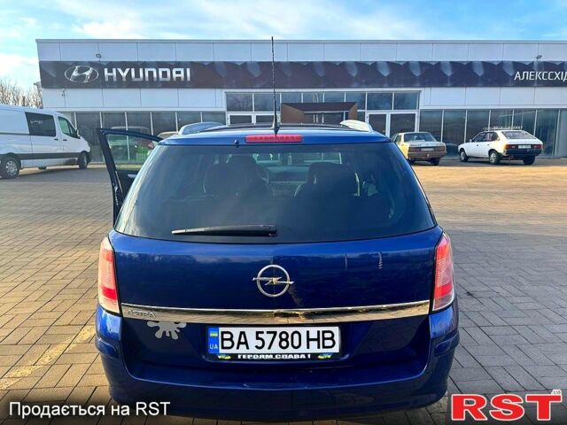 Синий Опель Астра, объемом двигателя 1.4 л и пробегом 220 тыс. км за 5100 $, фото 3 на Automoto.ua