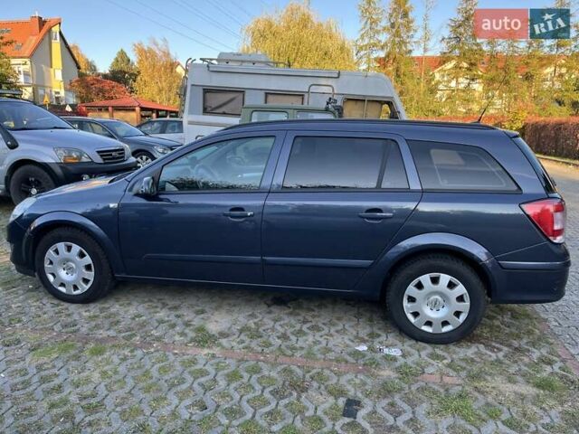 Синий Опель Астра, объемом двигателя 1.7 л и пробегом 238 тыс. км за 5000 $, фото 5 на Automoto.ua