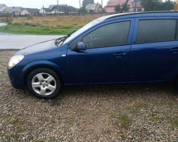 Синий Опель Астра, объемом двигателя 1.7 л и пробегом 244 тыс. км за 4800 $, фото 7 на Automoto.ua