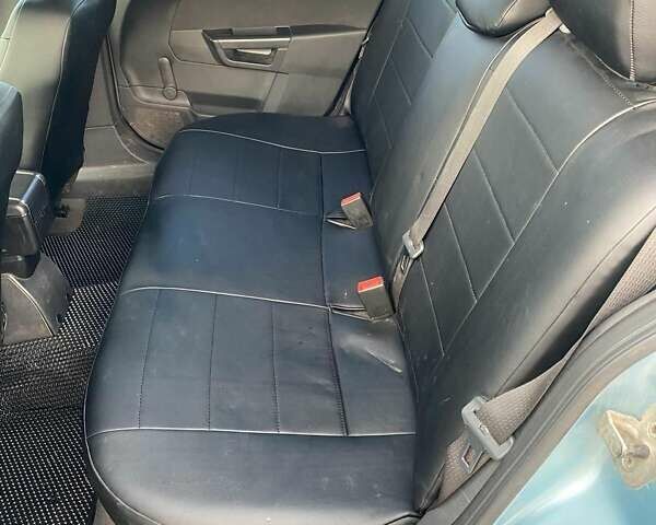 Синий Опель Астра, объемом двигателя 1.2 л и пробегом 245 тыс. км за 5000 $, фото 10 на Automoto.ua