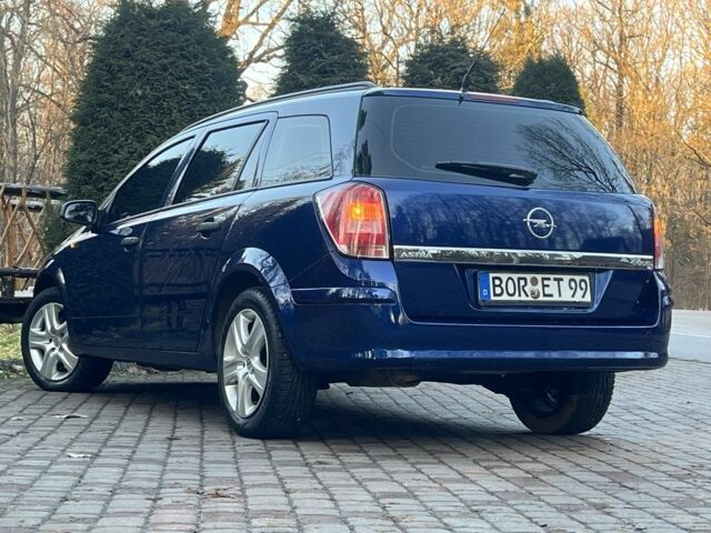 Синий Опель Астра, объемом двигателя 1.7 л и пробегом 235 тыс. км за 5600 $, фото 16 на Automoto.ua