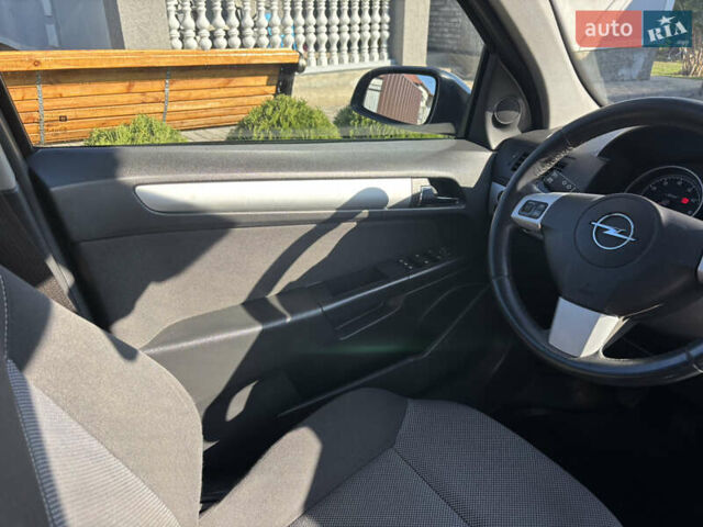 Синий Опель Астра, объемом двигателя 1.8 л и пробегом 209 тыс. км за 5800 $, фото 27 на Automoto.ua
