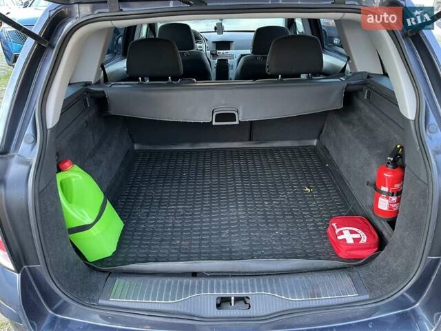 Синий Опель Астра, объемом двигателя 1.7 л и пробегом 238 тыс. км за 5000 $, фото 6 на Automoto.ua