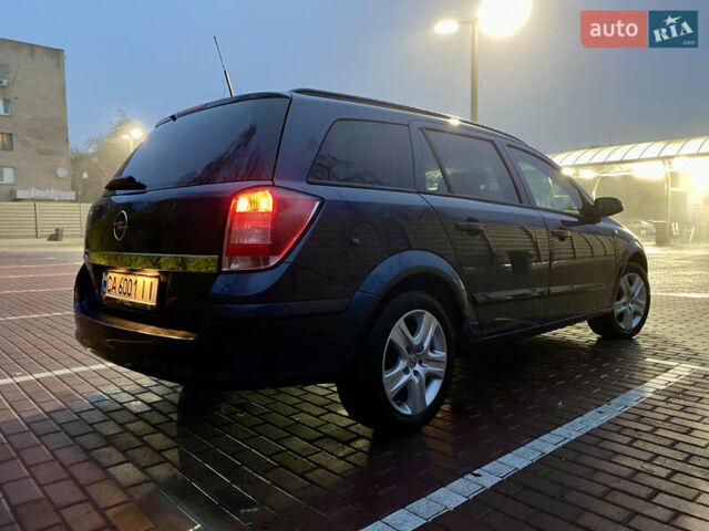 Синий Опель Астра, объемом двигателя 1.8 л и пробегом 194 тыс. км за 6900 $, фото 61 на Automoto.ua