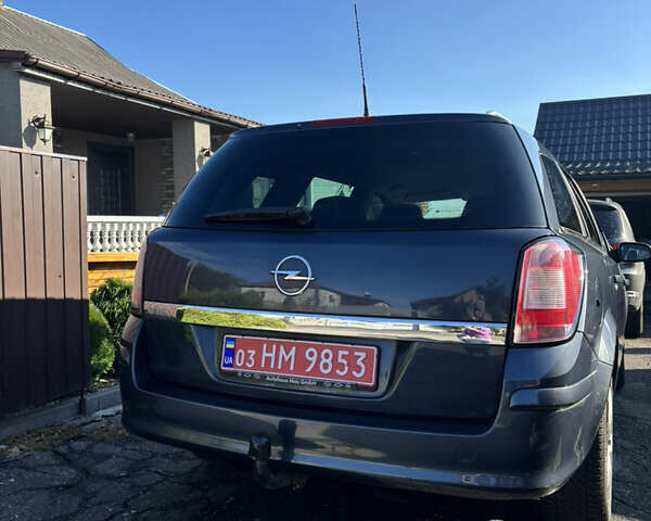 Синий Опель Астра, объемом двигателя 1.8 л и пробегом 209 тыс. км за 5800 $, фото 6 на Automoto.ua