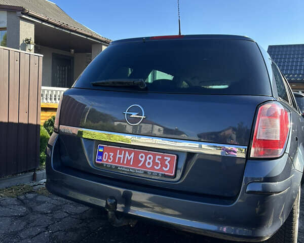 Синий Опель Астра, объемом двигателя 1.8 л и пробегом 209 тыс. км за 5800 $, фото 7 на Automoto.ua