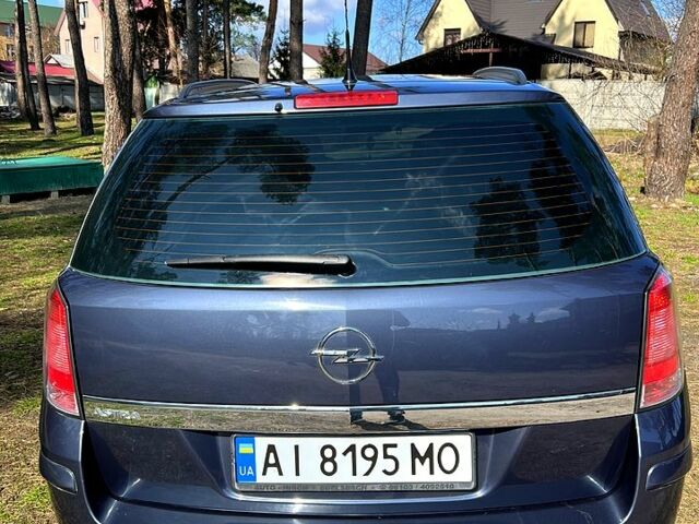 Синий Опель Астра, объемом двигателя 1.6 л и пробегом 211 тыс. км за 6300 $, фото 4 на Automoto.ua