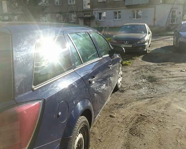 Синий Опель Астра, объемом двигателя 1.91 л и пробегом 175 тыс. км за 5700 $, фото 1 на Automoto.ua