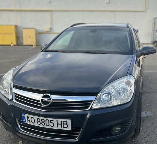 Синий Опель Астра, объемом двигателя 1.69 л и пробегом 240 тыс. км за 5500 $, фото 1 на Automoto.ua