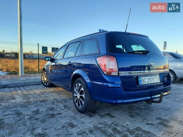 Синий Опель Астра, объемом двигателя 1.7 л и пробегом 250 тыс. км за 6000 $, фото 18 на Automoto.ua