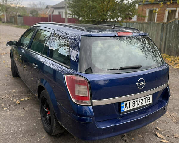 Опель Астра 2009 в Черкассах на Automoto.ua Синий Опель Астра, объемом двигателя 1.69 л и пробегом 250 тыс. км за 5000 $, фото 5 на Automoto.ua