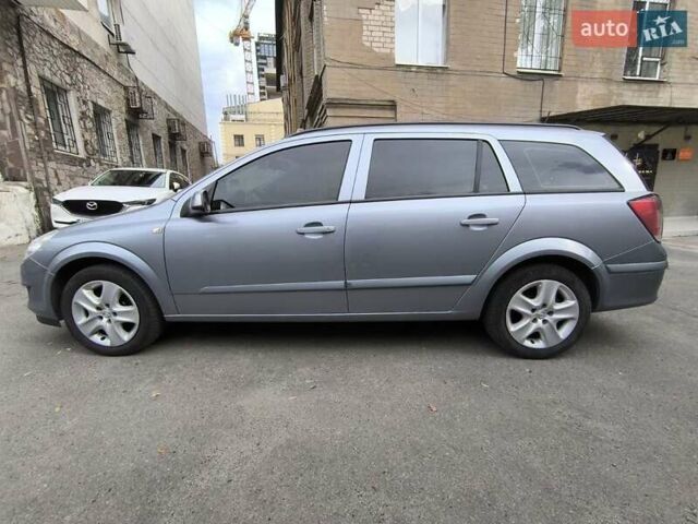 Синий Опель Астра, объемом двигателя 1.6 л и пробегом 210 тыс. км за 5300 $, фото 28 на Automoto.ua