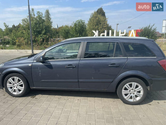 Синий Опель Астра, объемом двигателя 1.7 л и пробегом 220 тыс. км за 5900 $, фото 6 на Automoto.ua