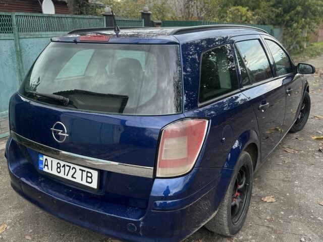 Опель Астра 2009 в Черкассах на Automoto.ua Синий Опель Астра, объемом двигателя 1.7 л и пробегом 240 тыс. км за 5000 $, фото 4 на Automoto.ua