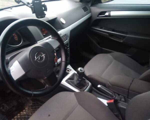 Синий Опель Астра, объемом двигателя 1.7 л и пробегом 244 тыс. км за 4800 $, фото 2 на Automoto.ua