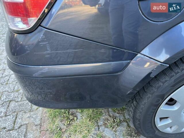 Синий Опель Астра, объемом двигателя 1.7 л и пробегом 238 тыс. км за 5000 $, фото 3 на Automoto.ua