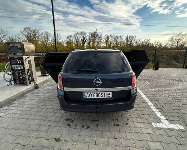 Синий Опель Астра, объемом двигателя 1.69 л и пробегом 240 тыс. км за 5500 $, фото 5 на Automoto.ua