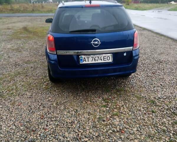 Синий Опель Астра, объемом двигателя 1.7 л и пробегом 244 тыс. км за 4800 $, фото 14 на Automoto.ua