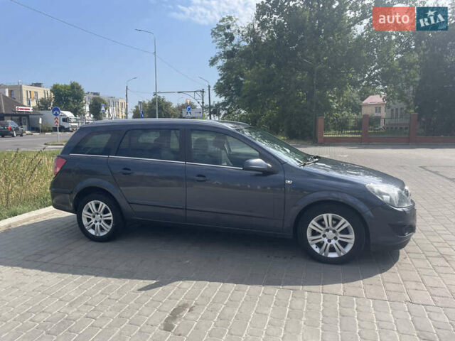 Синий Опель Астра, объемом двигателя 1.7 л и пробегом 220 тыс. км за 5900 $, фото 13 на Automoto.ua