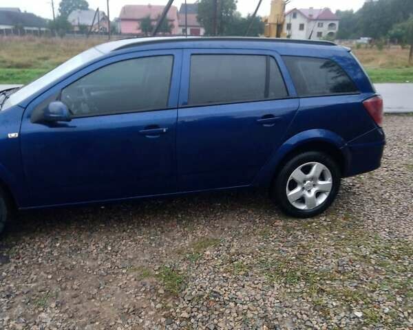 Синий Опель Астра, объемом двигателя 1.7 л и пробегом 244 тыс. км за 4800 $, фото 5 на Automoto.ua