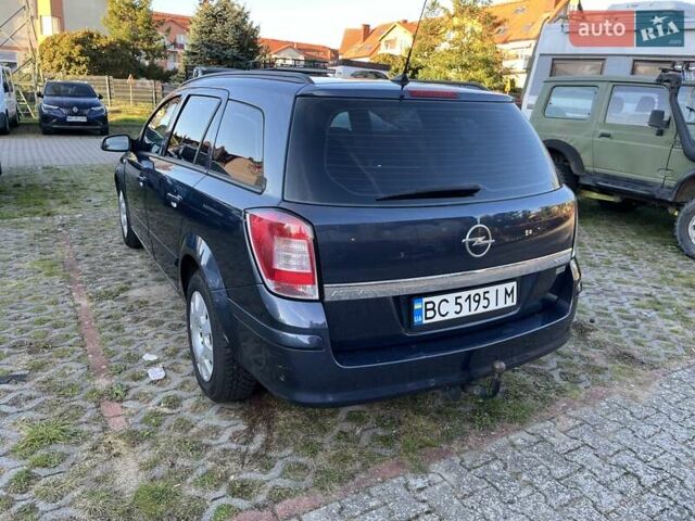 Синий Опель Астра, объемом двигателя 1.7 л и пробегом 238 тыс. км за 5000 $, фото 9 на Automoto.ua