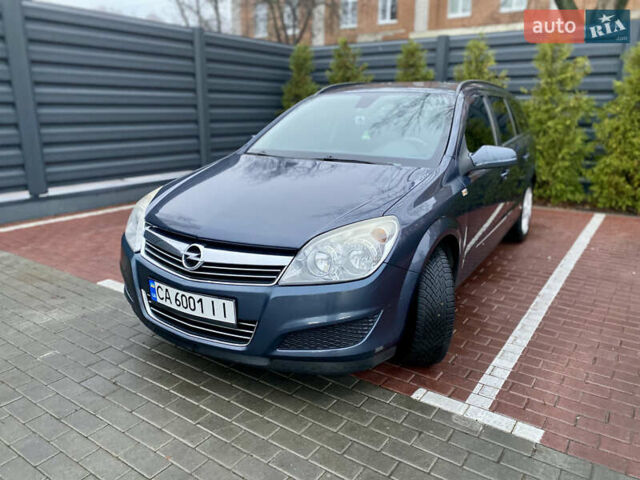 Синий Опель Астра, объемом двигателя 1.8 л и пробегом 194 тыс. км за 6900 $, фото 1 на Automoto.ua