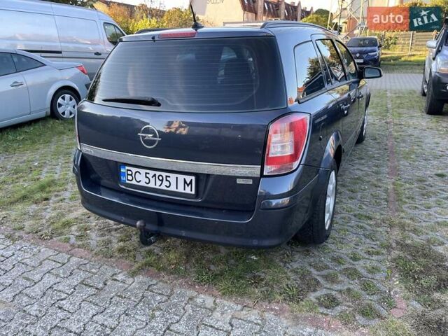 Синий Опель Астра, объемом двигателя 1.7 л и пробегом 238 тыс. км за 5000 $, фото 10 на Automoto.ua